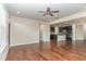 Open living space with hardwood floors and a view of the kitchen at 226 Begen St, Morrisville, NC 27560