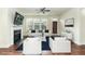 Living room with hardwood floors, fireplace, and built-in shelving at 226 Begen St, Morrisville, NC 27560