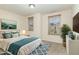 Inviting main bedroom with neutral tones, large windows, and tasteful decor at 226 Begen St, Morrisville, NC 27560