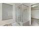 Modern bathroom featuring a glass-enclosed shower with sleek tile and a built-in niche at 226 Begen St, Morrisville, NC 27560