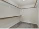 Spacious walk-in closet with ample shelving and hanging space for organized storage at 226 Begen St, Morrisville, NC 27560