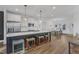 Modern kitchen featuring a large center island with seating, stainless steel appliances, and an open concept layout at 283 Daniel Ridge Rd, Wendell, NC 27591