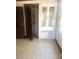 Room with original built-in cabinets and vintage flooring at 420 E Hinton St, Clayton, NC 27520