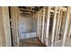 Framed bathroom featuring plumbing and a tub, awaiting finishing touches at 3852 Well Fleet Drive, Willow Springs, NC 27592