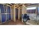 Framed bathroom featuring plumbing and a shower, awaiting finishing touches at 3852 Well Fleet Drive, Willow Springs, NC 27592