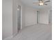 Bedroom featuring plush carpeting, ceiling fan, and multiple doorways at 3856 Well Fleet Drive, Fuquay Varina, NC 27526