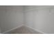 A walk-in closet with wire shelving and neutral walls in an unfinished space at 3856 Well Fleet Drive, Fuquay Varina, NC 27526