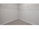 Walk-in closet with carpeted flooring and wire shelving at 3856 Well Fleet Drive, Fuquay Varina, NC 27526