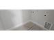 Laundry room with neutral walls, baseboard trim, and utility connections at 3928 Well Fleet Drive, Fuquay Varina, NC 27526