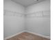 Large walk-in closet with wire shelving for convenient storage at 3928 Well Fleet Drive, Fuquay Varina, NC 27526