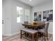 Dining area with wooden table and bench seating at 3928 Well Fleet Drive, Fuquay Varina, NC 27526