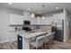 Modern kitchen with stainless steel appliances and island at 3928 Well Fleet Drive, Fuquay Varina, NC 27526
