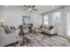 Spacious living room with sofa and ceiling fan at 3928 Well Fleet Drive, Fuquay Varina, NC 27526