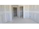 Drywalled hallway with doors and smooth walls ready for personalized design and decorative elements at 3930 Well Fleet Drive, Fuquay Varina, NC 27526