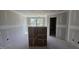 Open drywall hallway with lighting and smooth walls ready for personal decor and finishing touches at 3930 Well Fleet Drive, Fuquay Varina, NC 27526