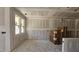 Bright living room ready for paint with windows allowing natural light and a smooth drywall surface at 3930 Well Fleet Drive, Fuquay Varina, NC 27526