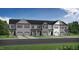 New townhome community with attached garages at 3930 Well Fleet Drive, Fuquay Varina, NC 27526