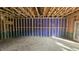 Unfinished basement showcasing a large open layout, exposed framing, and utilities at 3932 Well Fleet Drive, Fuquay Varina, NC 27526