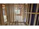 Hallway in construction showcasing framework, plumbing, and future room placements at 3932 Well Fleet Drive, Fuquay Varina, NC 27526