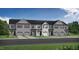 New townhomes boast attached garages, manicured lawns, and modern architectural design at 3932 Well Fleet Drive, Fuquay Varina, NC 27526
