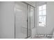 Modern shower with glass enclosure and white subway tile at 3932 Well Fleet Drive, Fuquay Varina, NC 27526