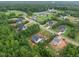 Aerial view of homes nestled among lush trees and landscaping in neighborhood at 40 Moonraker Dr, Spring Hope, NC 27882