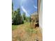 Home boasts a spacious backyard, wooden deck and wood staircase at 40 Moonraker Dr, Spring Hope, NC 27882