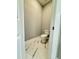 Stylish half bath features marble floors and modern fixtures at 40 Moonraker Dr, Spring Hope, NC 27882