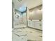 Luxurious bathroom with a double vanity, elegant lighting, and a spacious tiled walk-in shower at 40 Moonraker Dr, Spring Hope, NC 27882