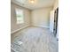 Light-filled bedroom with plush carpeting, a window view, and a clean, neutral palette at 40 Moonraker Dr, Spring Hope, NC 27882