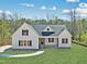 Inviting home with a stone foundation and freshly cut lawn at 40 Moonraker Dr, Spring Hope, NC 27882