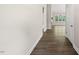 Inviting hallway showcasing hardwood floors and bright interior at 40 Moonraker Dr, Spring Hope, NC 27882