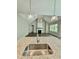 An open-concept kitchen with stainless steel appliances and a granite countertop island at 40 Moonraker Dr, Spring Hope, NC 27882