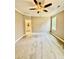 Main bedroom featuring carpet covered in protective plastic, a window and attached bathroom at 40 Moonraker Dr, Spring Hope, NC 27882