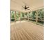 Spacious covered porch with a ceiling fan, perfect for outdoor relaxation at 40 Moonraker Dr, Spring Hope, NC 27882