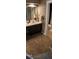 Bathroom featuring a vanity with a sink and a view of the toilet and shower area at 42 Melstone Turn, Durham, NC 27707