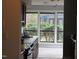 Bright kitchen with a large window and view of greenery at 42 Melstone Turn, Durham, NC 27707