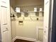 Laundry room with shelving, washer hookup, and dryer hookup, providing space for storage and appliances at 42 Melstone Turn, Durham, NC 27707