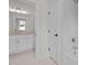 Well-lit bathroom showing white subway tile and a shower and tub combination at 7813 Ailesbury Rd, Wake Forest, NC 27587