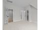 Spacious bedroom featuring neutral colors, carpet flooring, and multiple closet options at 7813 Ailesbury Rd, Wake Forest, NC 27587