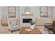 Cozy living room featuring a modern fireplace, stylish decor, and comfortable seating at 7813 Ailesbury Rd, Wake Forest, NC 27587
