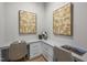 Office space with two desks, carpet, built in storage, and decor for a comfortable work setting at 7813 Ailesbury Rd, Wake Forest, NC 27587