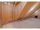 Unfinished attic space showing the roof support structure and subflooring ready for customization at 7813 Ailesbury Rd, Wake Forest, NC 27587