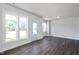 Inviting living room with hardwood floors and plenty of natural light at 85 Windchime Ct, Fuquay Varina, NC 27526
