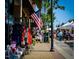 Street view of an outdoor market with the American flag hanging from the building at 85 Windchime Ct, Fuquay Varina, NC 27526