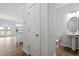 Small half bathroom with toilet and sink near kitchen and living room at 1040 Westerland Way # 212, Durham, NC 27703