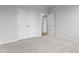 Well-lit bedroom with plush carpeting and double door closet at 1040 Westerland Way # 212, Durham, NC 27703
