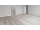 Spacious bedroom with neutral carpeting and ample closet space at 1040 Westerland Way # 212, Durham, NC 27703