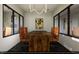 Modern conference room with large table and leather chairs at 1040 Westerland Way # 212, Durham, NC 27703