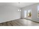 Dining room with hardwood floors and access to backyard patio at 1040 Westerland Way # 212, Durham, NC 27703